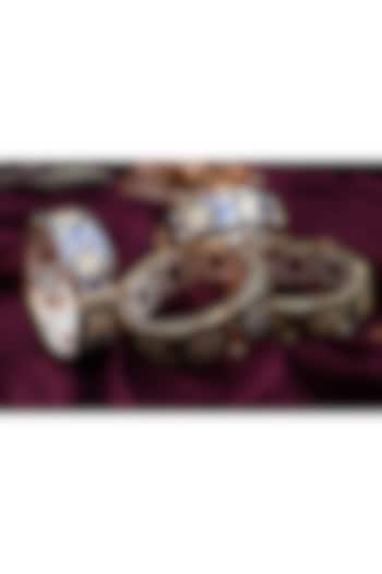 Gold Finish Blue Enamelled Bangle by KRAFTSMITHS at Pernia's Pop Up Shop