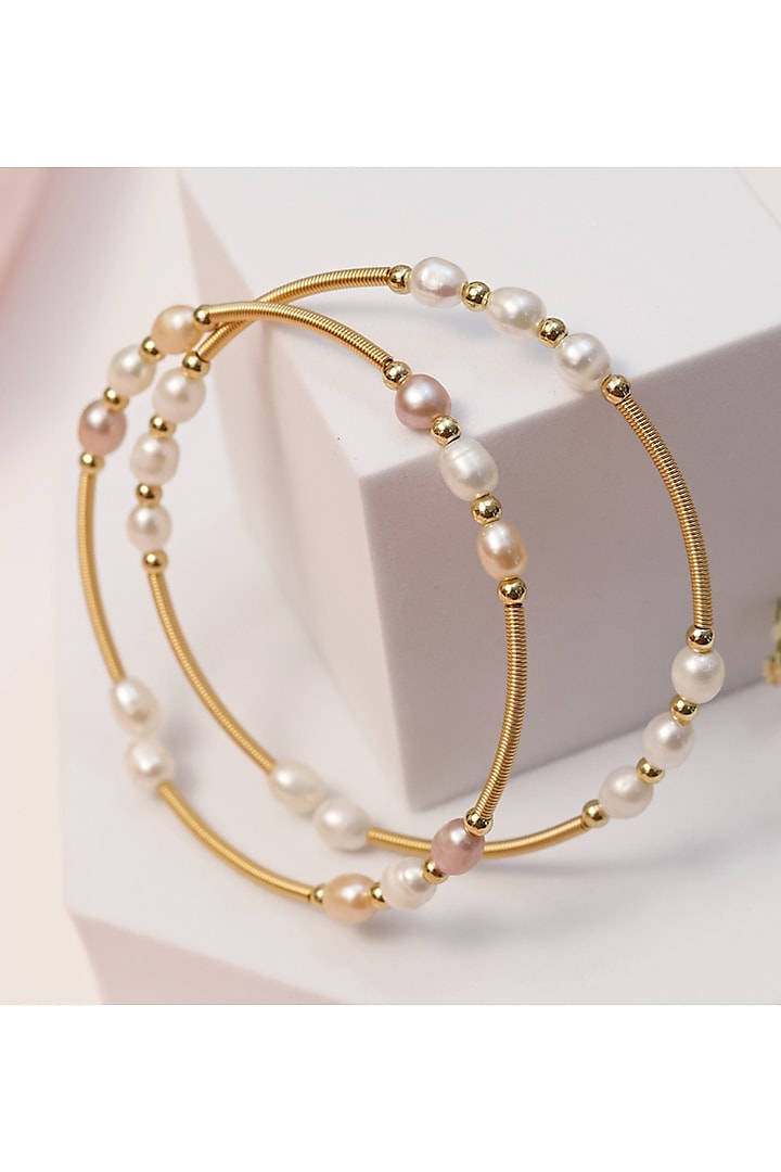 Gold Finish Pearl Handcrafted Bracelet (Set Of 2) by KRAFTSMITHS at Pernia's Pop Up Shop