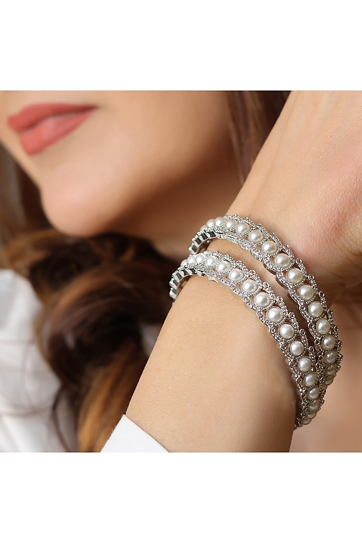 Silver Finish Pearl & CZ Stone Handcrafted Bangles (Set Of 2) by KRAFTSMITHS at Pernia's Pop Up Shop