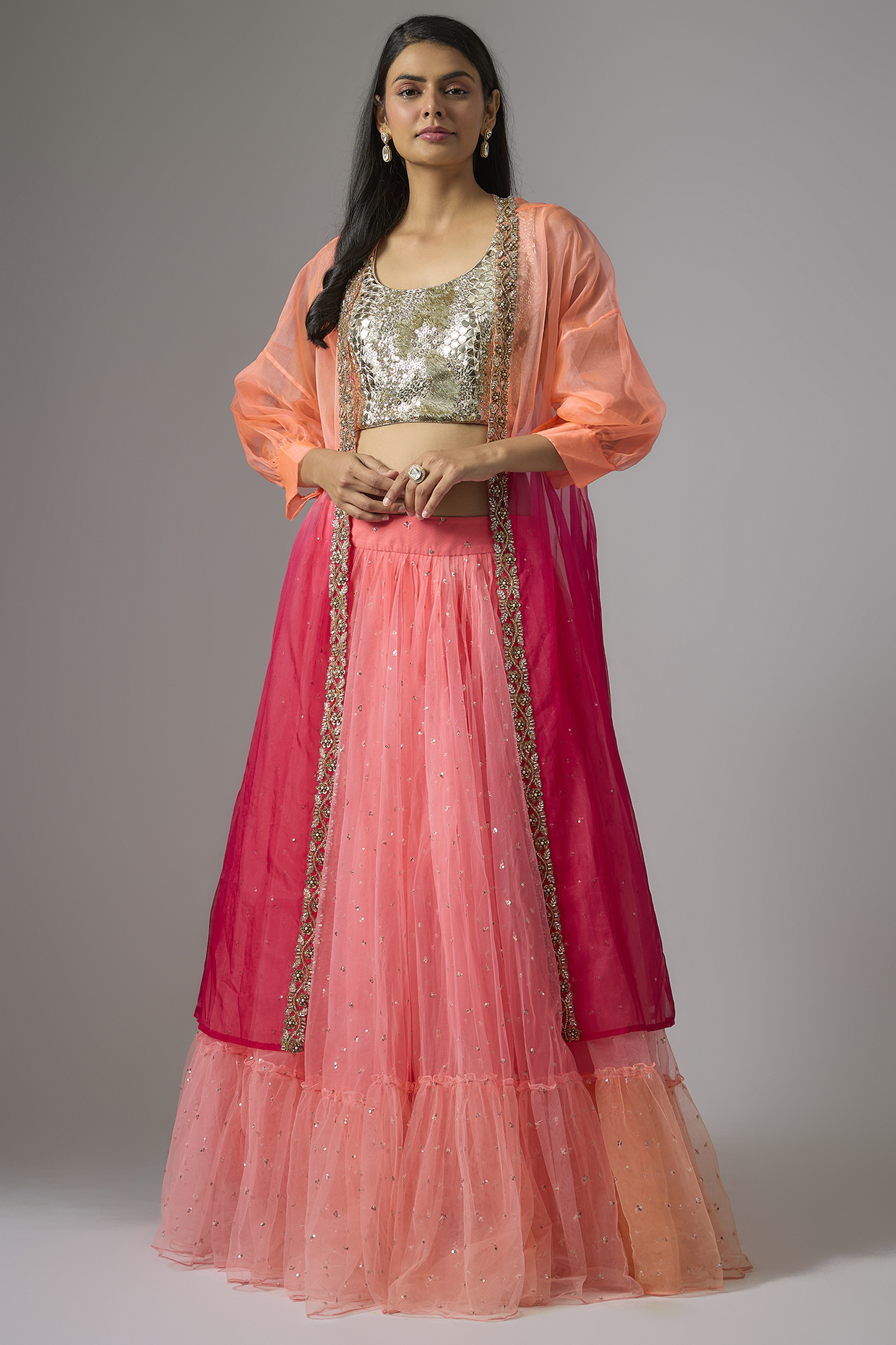 Peach Net Tiered Jacket Wedding Lehenga Set by Kriti Bapna at Pernia's Pop Up Shop