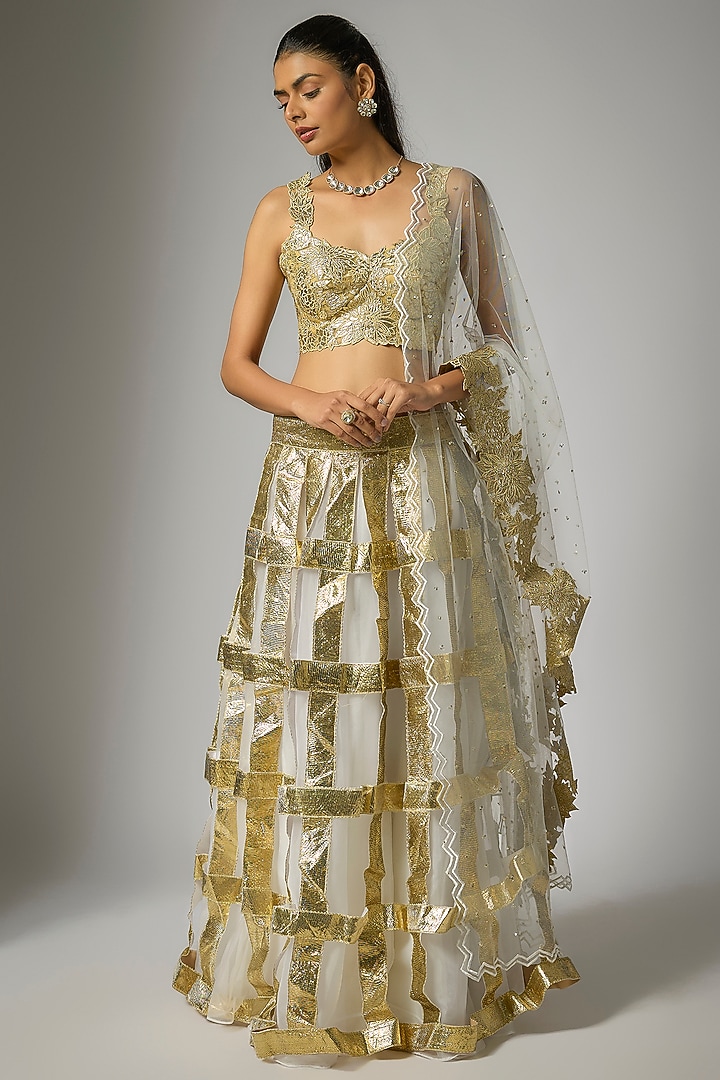 White & Gold Organza Applique Embroidered Wedding Lehenga Set by Kriti Bapna at Pernia's Pop Up Shop