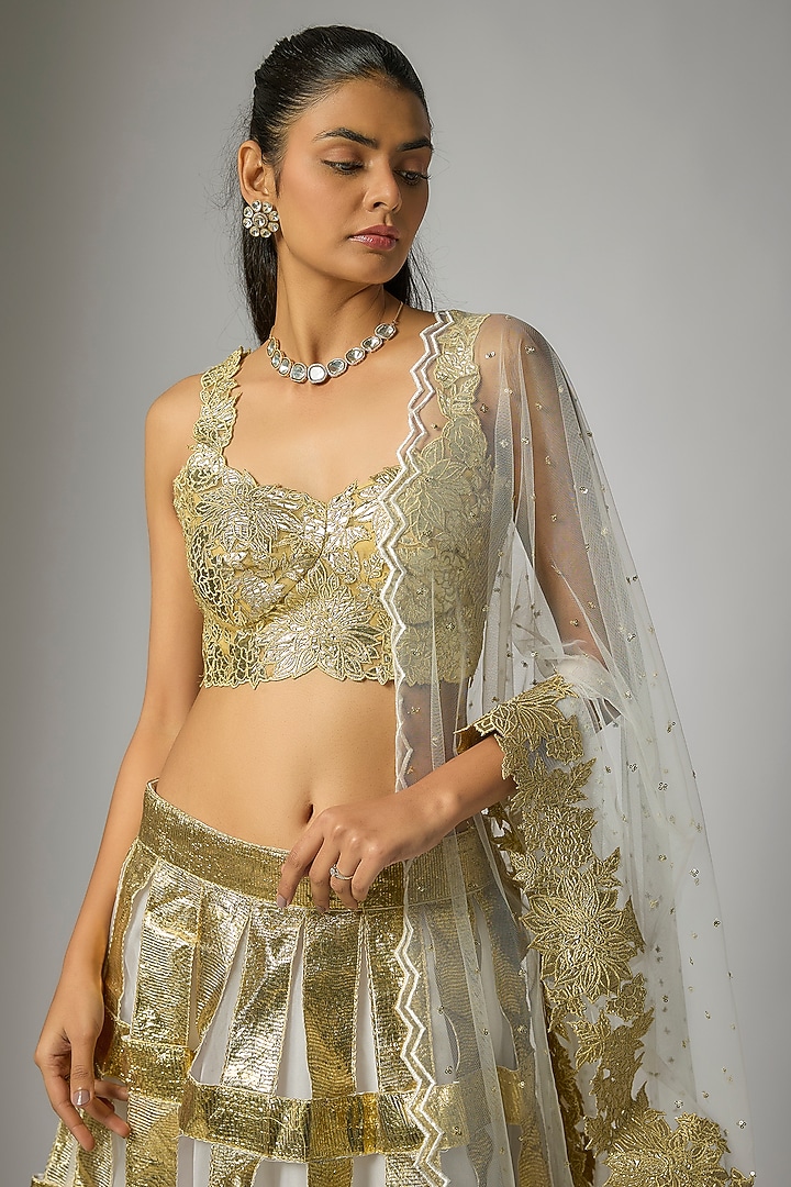 White & Gold Organza Applique Embroidered Wedding Lehenga Set by Kriti Bapna at Pernia's Pop Up Shop