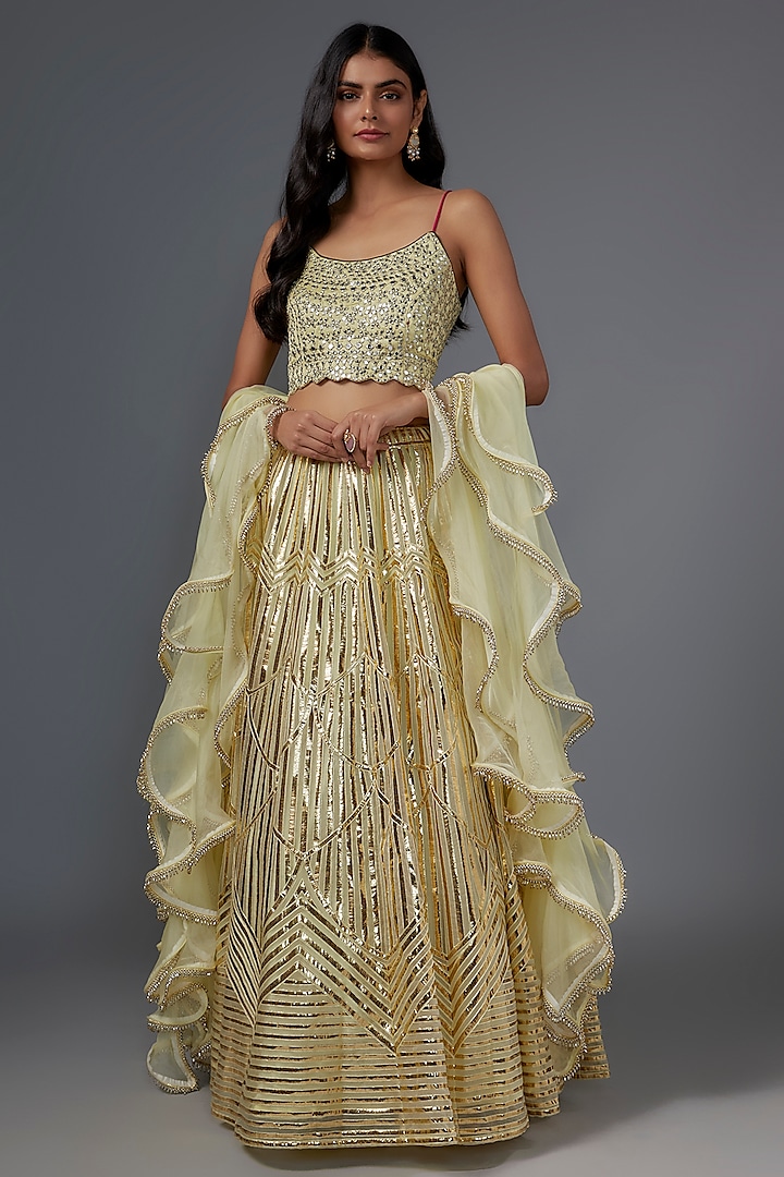 Yellow Silk Geometric Embroidered Lehenga Set by Kriti Bapna at Pernia's Pop Up Shop