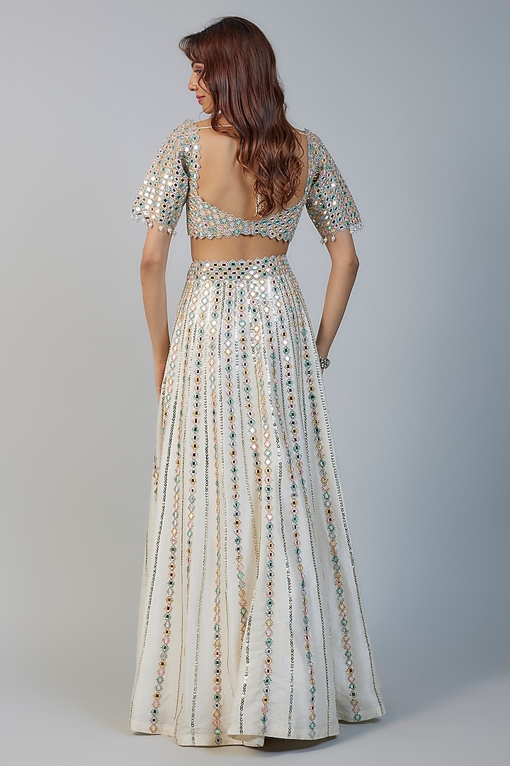 Ivory Raw Silk & Net Mirror Embroidered Wedding Lehenga Set by Kresha Lulla at Pernia's Pop Up Shop