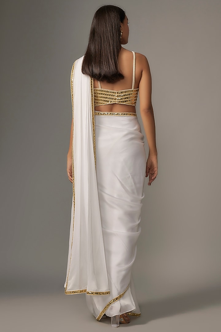Ivory Satin Sequins Embroidered Reception Saree Set by Kresha Lulla at Pernia's Pop Up Shop