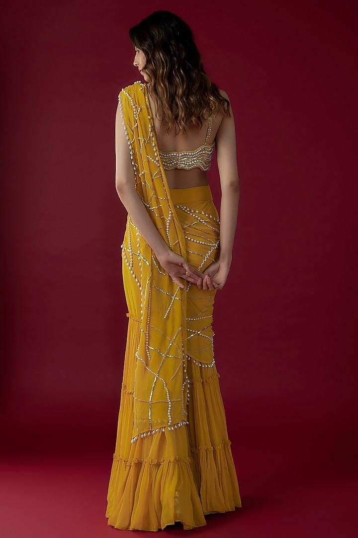 Mustard Georgette Sequins Embroidered Tiered Sharara Reception Saree Set by Kresha Lulla at Pernia's Pop Up Shop