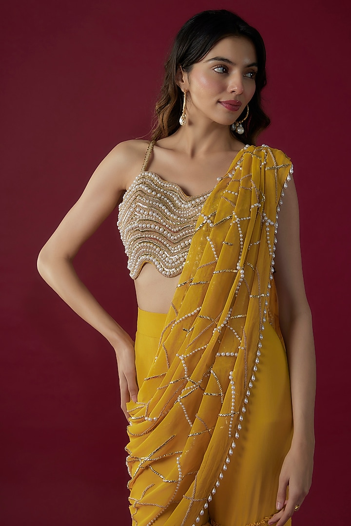 Mustard Georgette Sequins Embroidered Tiered Sharara Reception Saree Set by Kresha Lulla at Pernia's Pop Up Shop