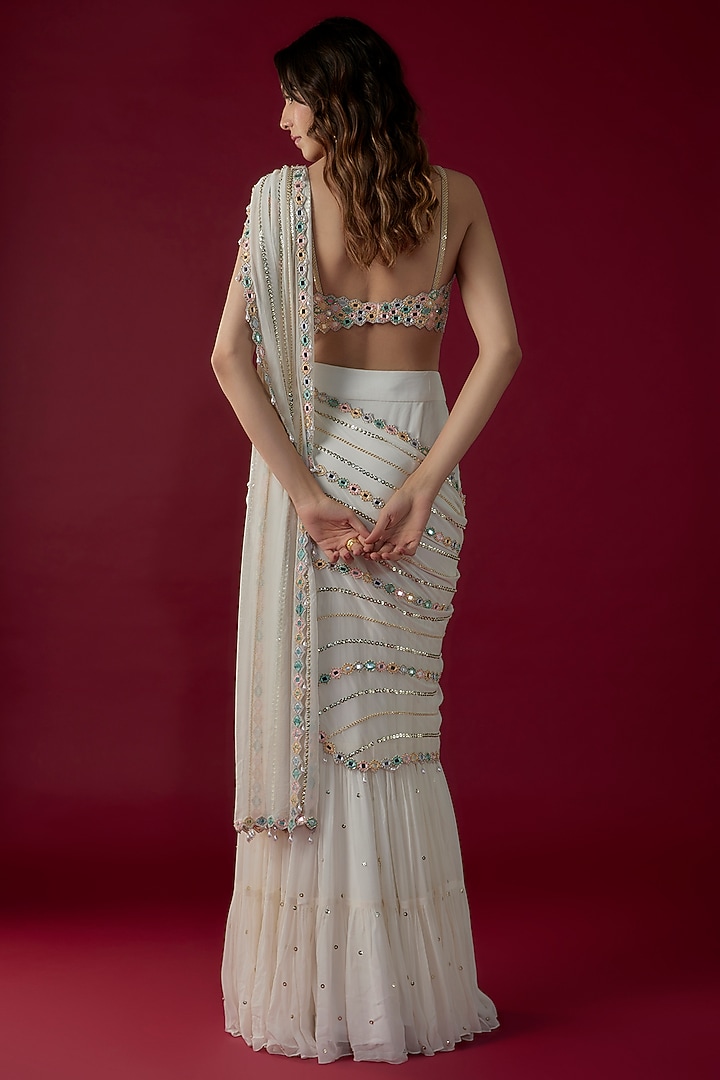 Ivory Georgette Mirror Embroidered Tiered Pre-Stitched Reception Saree Set by Kresha Lulla at Pernia's Pop Up Shop