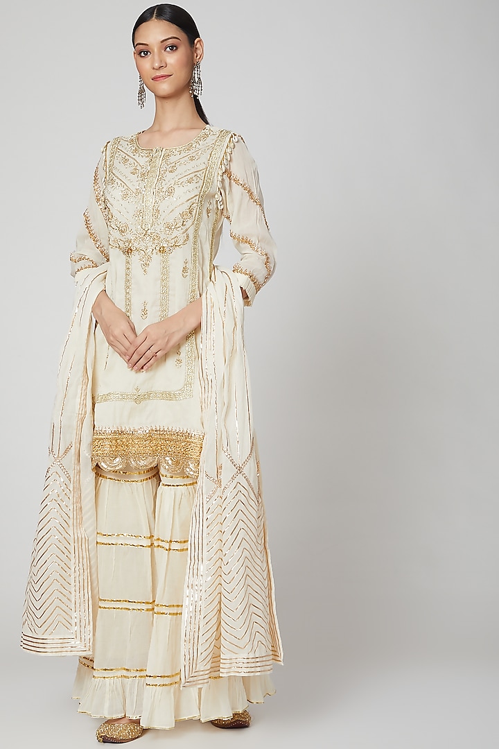 Off White Embroidered Gharara Set by kunwarani ritu