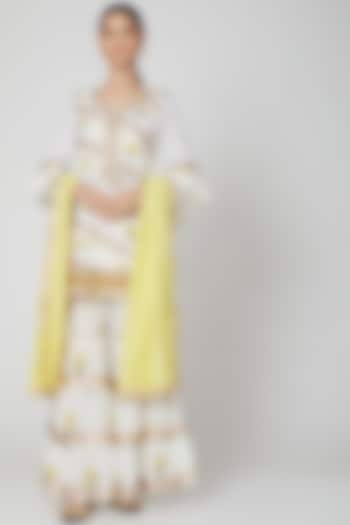 White Embroidered Gharara Set With Yellow Dupatta by kunwarani ritu
