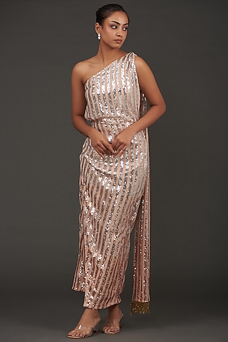 Beige Lycra Shimmer Off-Shoulder Draped Gown by kunwarani ritu