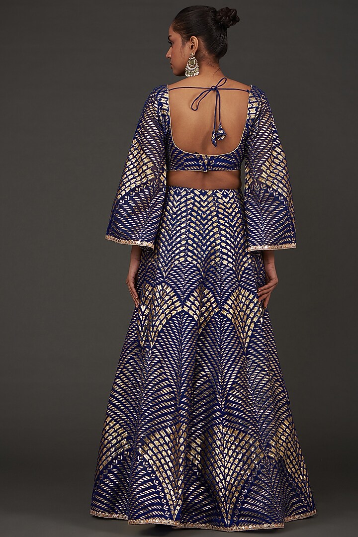 Electric Blue Net Patchwork Embroidered Wedding Lehenga Set by kunwarani ritu at Pernia's Pop Up Shop