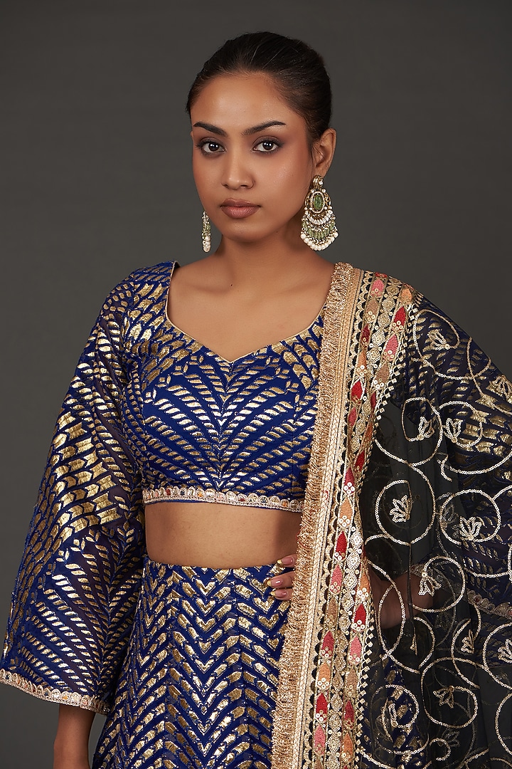 Electric Blue Net Patchwork Embroidered Wedding Lehenga Set by kunwarani ritu at Pernia's Pop Up Shop