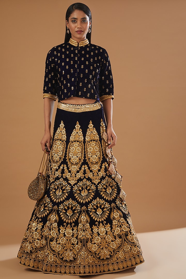 Midnight Blue Velvet Embroidered Lehenga Set by kunwarani ritu