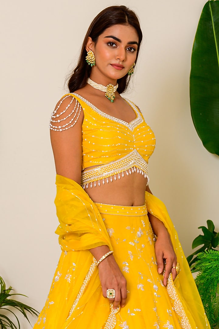 Vibrant Yellow Embroidered Bridal Lehenga Set by Kritika kataria at Pernia's Pop Up Shop