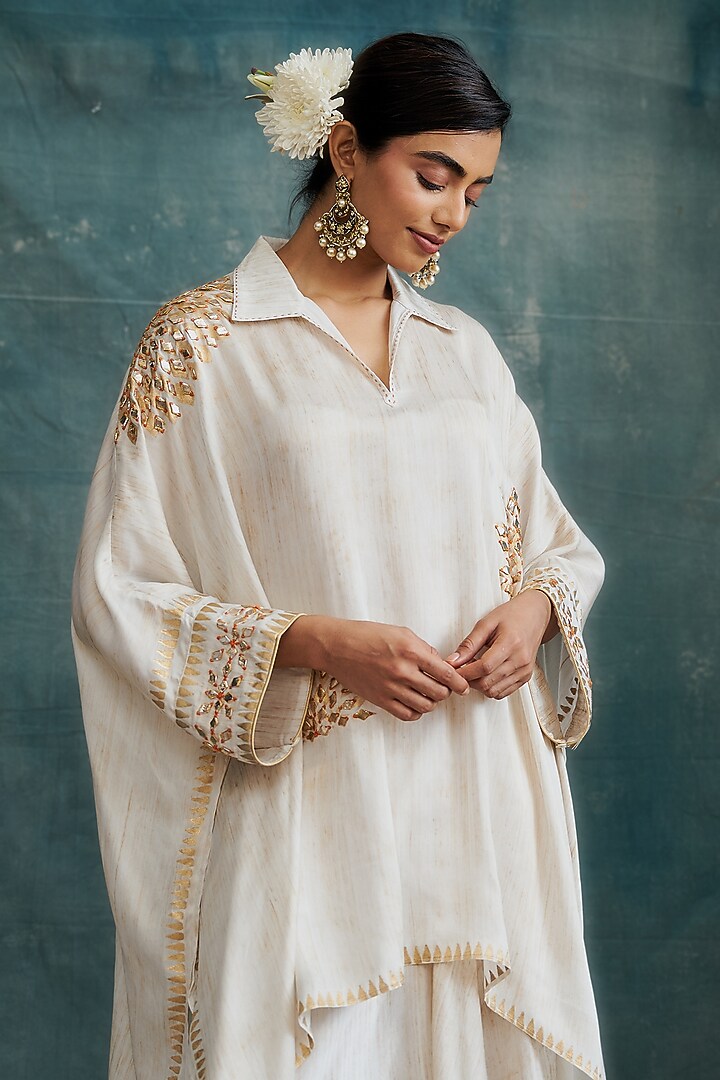 Ivory Modal Gota Embroidered & Block Printed Kaftan Tunic by Krishna Mehta at Pernia's Pop Up Shop