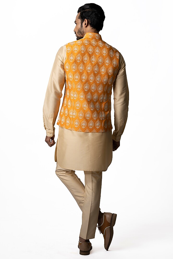 Orange Tussar Embroidered & Block Printed Bundi Jacket by Krishna Mehta Men at Pernia's Pop Up Shop