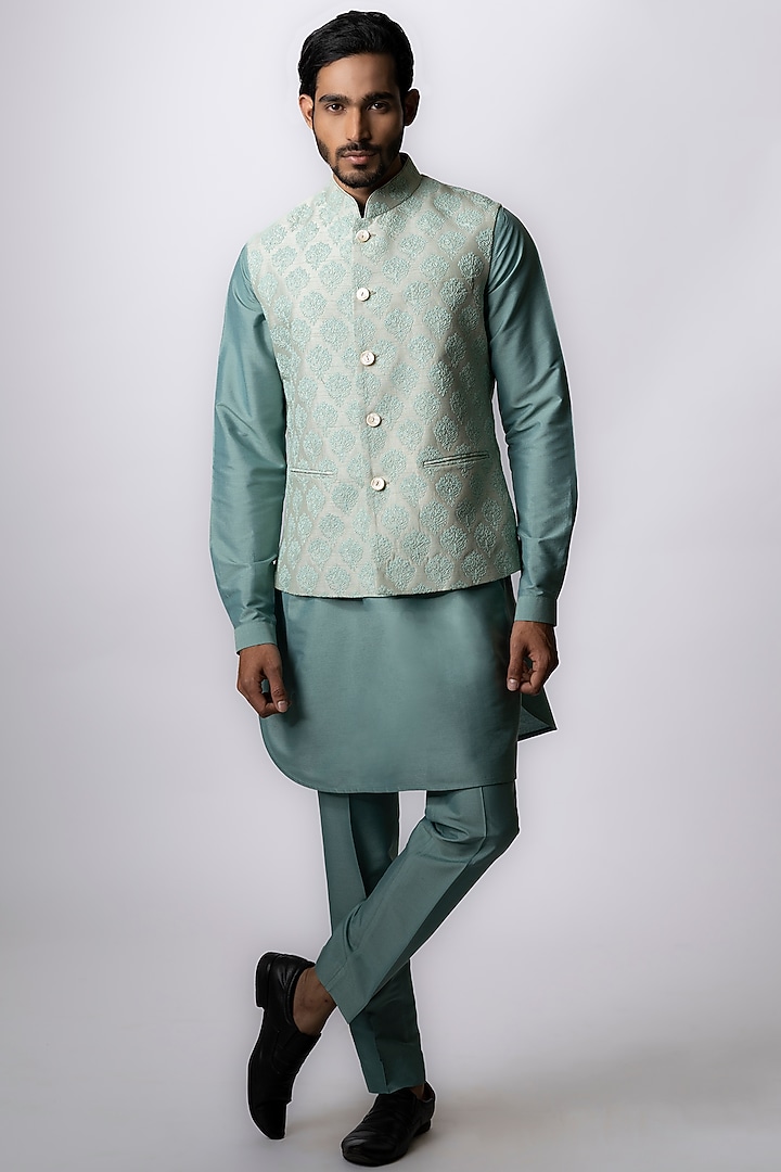 Powder Blue Tussar Embroidered & Block Printed Bundi Jacket by Krishna Mehta Men at Pernia's Pop Up Shop