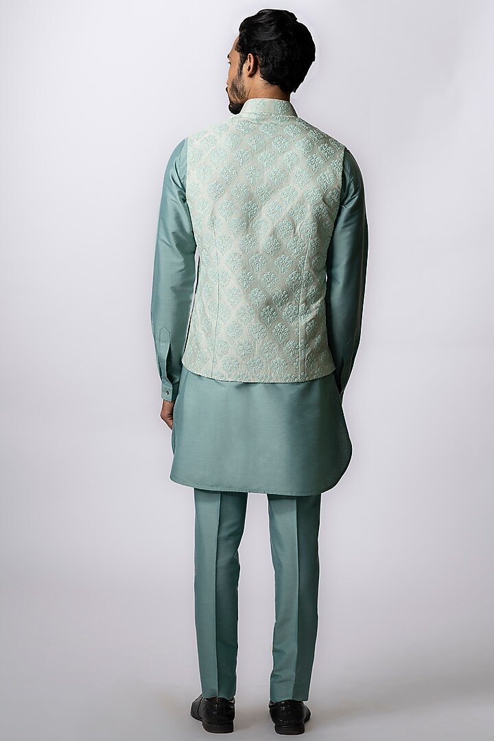 Powder Blue Tussar Embroidered & Block Printed Bundi Jacket by Krishna Mehta Men at Pernia's Pop Up Shop