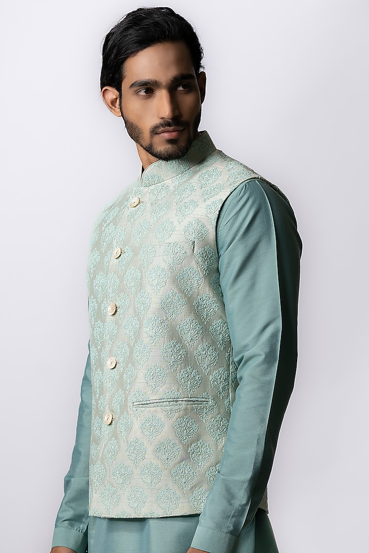 Powder Blue Tussar Embroidered & Block Printed Bundi Jacket by Krishna Mehta Men at Pernia's Pop Up Shop