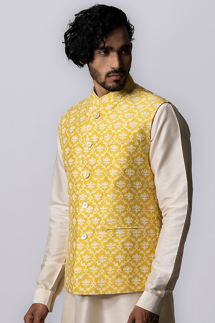 Yellow Tussar Embroidered & Block Printed Bundi Jacket by Krishna Mehta Men at Pernia's Pop Up Shop