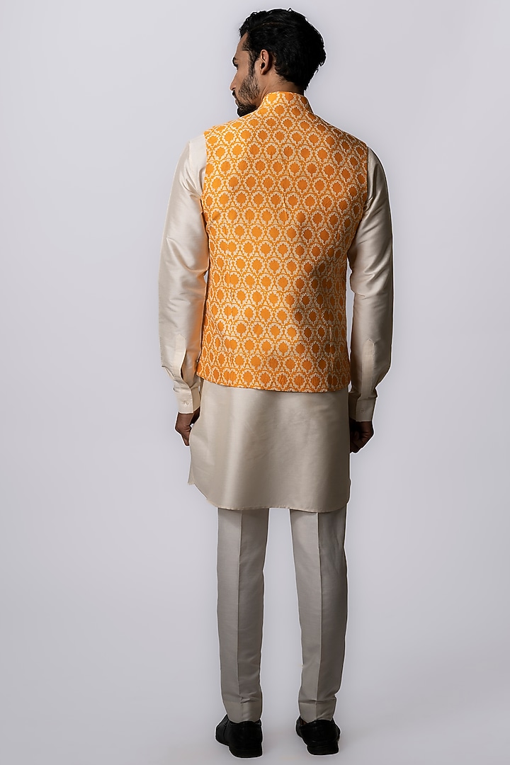 Bright Orange Tussar Block Printed Bundi Jacket by Krishna Mehta Men at Pernia's Pop Up Shop