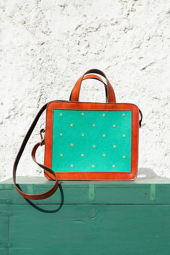 Green Hand Embroidered Hand Bag by KrutiArts at Pernia's Pop Up Shop