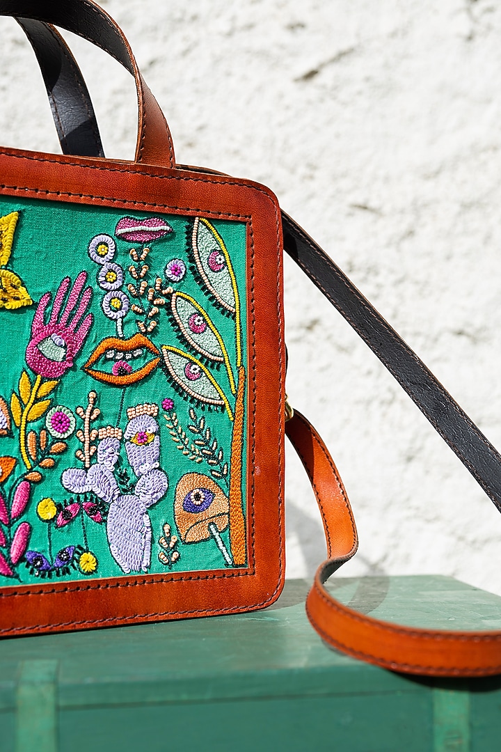 Green Hand Embroidered Hand Bag by KrutiArts at Pernia's Pop Up Shop