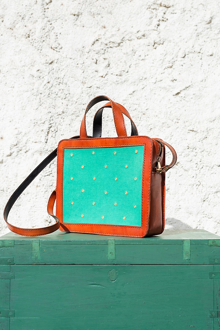 Green Hand Embroidered Hand Bag by KrutiArts at Pernia's Pop Up Shop