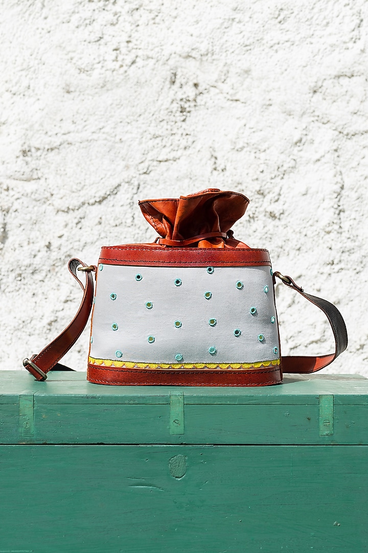 Grey Hand Embroidered Potli Bag by KrutiArts at Pernia's Pop Up Shop