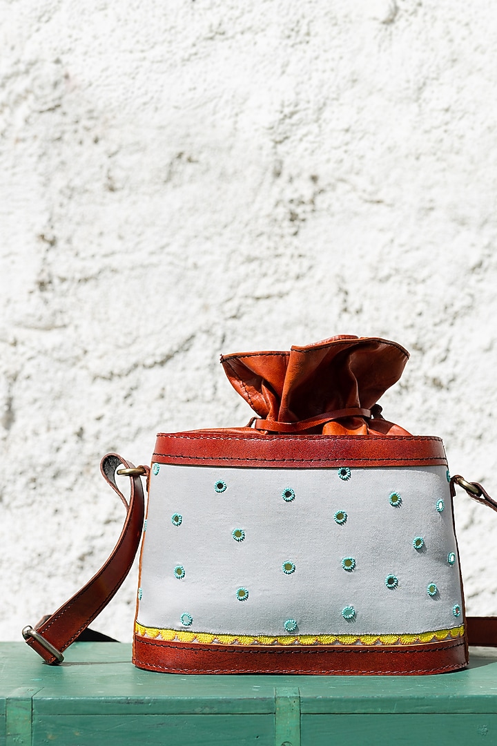 Grey Hand Embroidered Potli Bag by KrutiArts at Pernia's Pop Up Shop