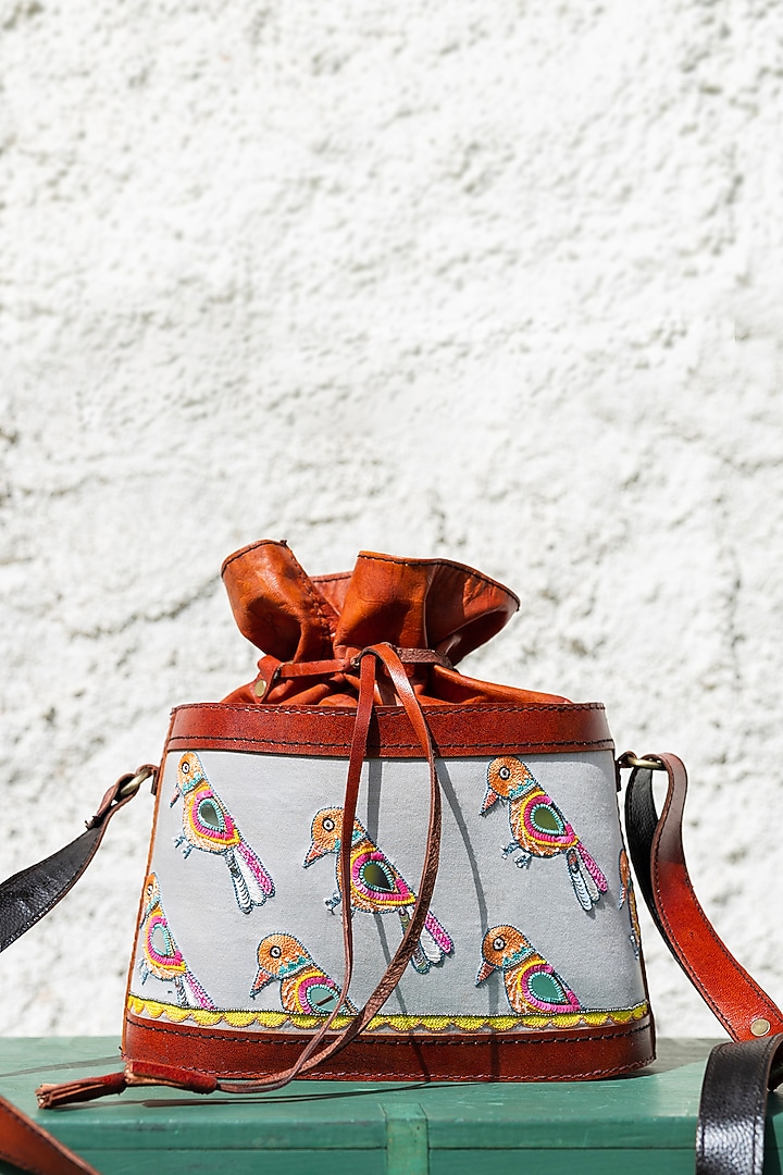 Grey Hand Embroidered Potli Bag by KrutiArts at Pernia's Pop Up Shop