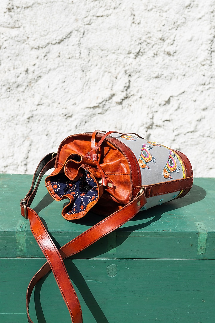Grey Hand Embroidered Potli Bag by KrutiArts at Pernia's Pop Up Shop