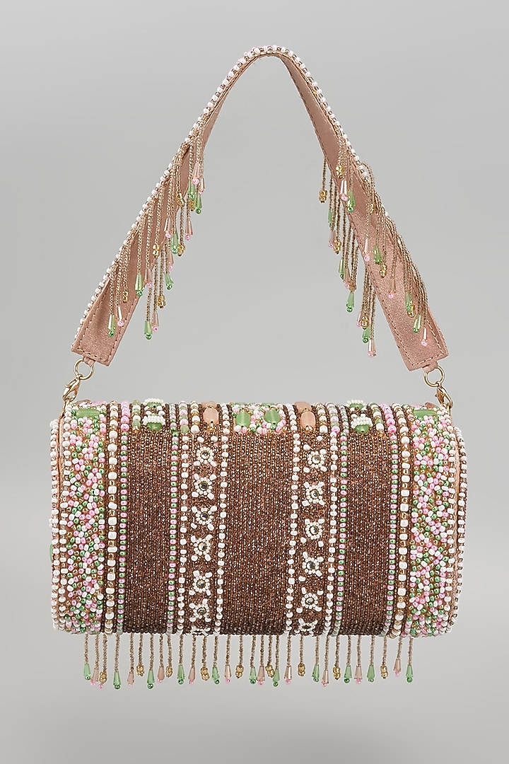 Pink Silk Tassel Embellished Bucket Bag by kreivo by vamanshi damania at Pernia's Pop Up Shop