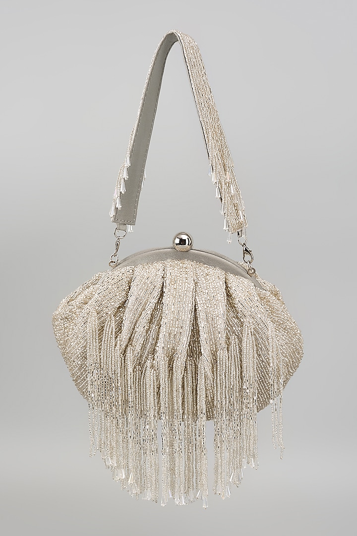 Silver Silk Tassel Embellished Potli Bag by kreivo by vamanshi damania at Pernia's Pop Up Shop