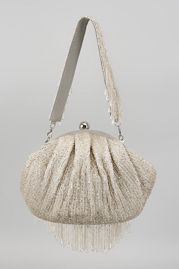 Silver Silk Tassel Embellished Potli Bag by kreivo by vamanshi damania at Pernia's Pop Up Shop