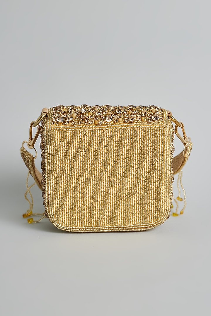 Gold Silk Beaded & Tassel Embellished Mini Bucket Bag by kreivo by vamanshi damania at Pernia's Pop Up Shop