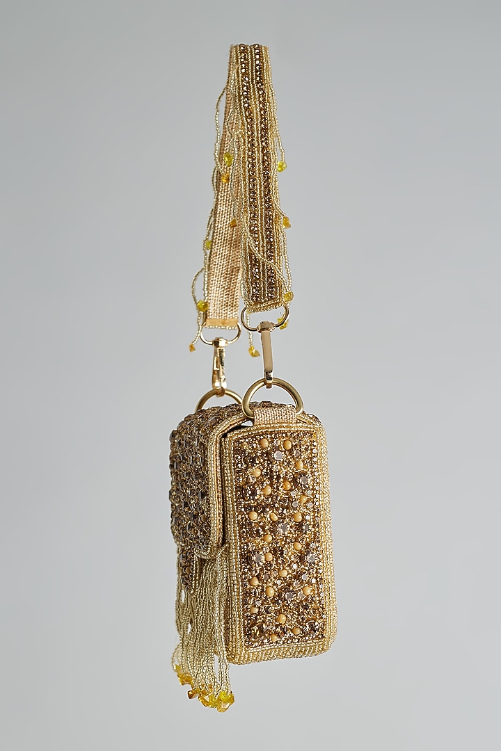 Gold Silk Beaded & Tassel Embellished Mini Bucket Bag by kreivo by vamanshi damania at Pernia's Pop Up Shop