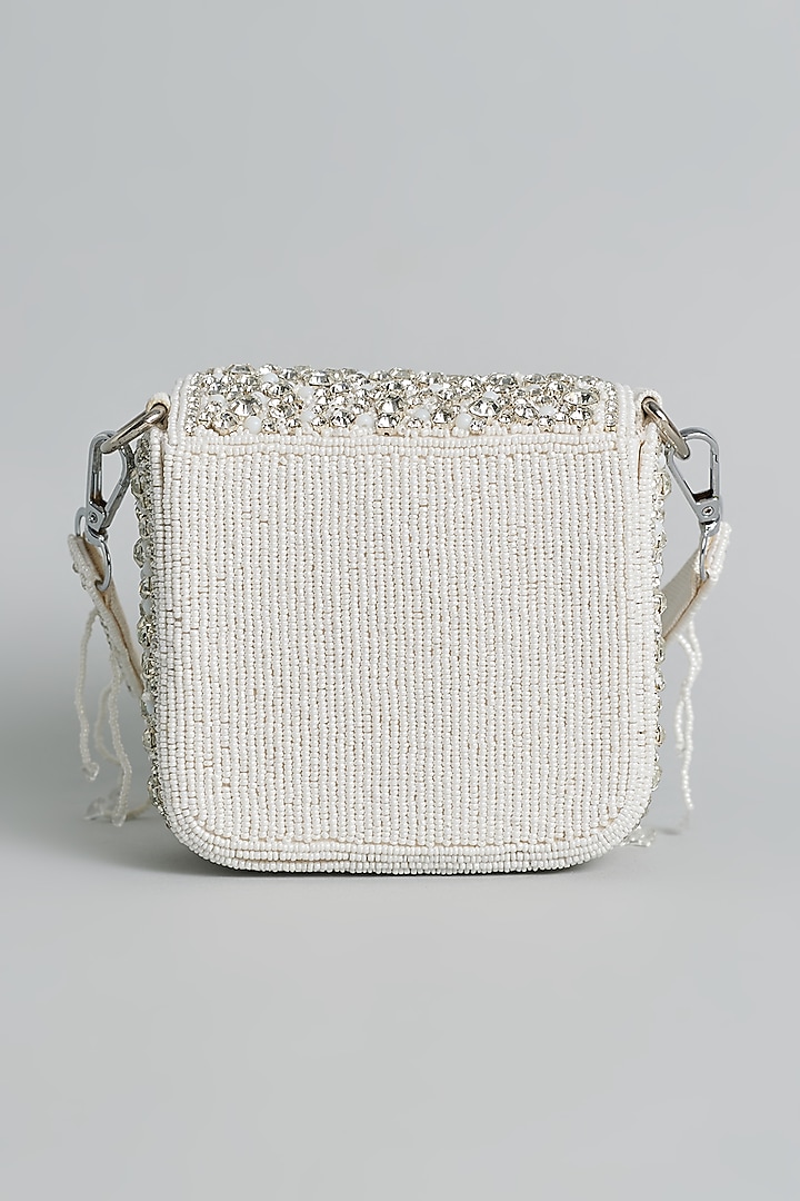 White Silk Beaded & Tassel Embellished Mini Bucket Bag by kreivo by vamanshi damania at Pernia's Pop Up Shop