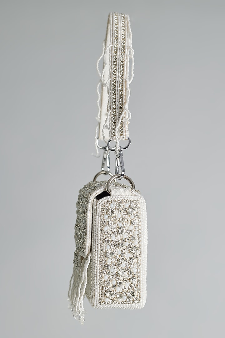 White Silk Beaded & Tassel Embellished Mini Bucket Bag by kreivo by vamanshi damania at Pernia's Pop Up Shop
