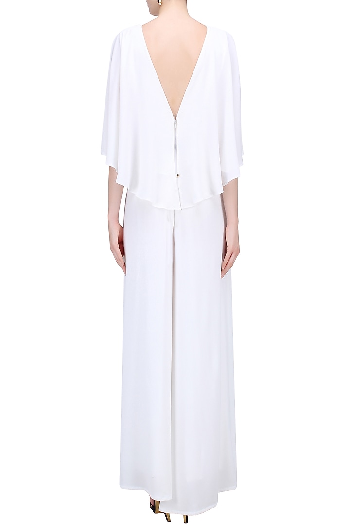White and gold buckle belt cape jumpsuit available only at Pernia's Pop Up Shop.