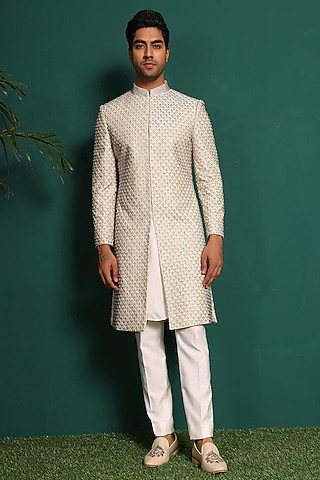 Ivory Raw Silk Cutdana Embellished Sherwani Set by Prateek Munjal