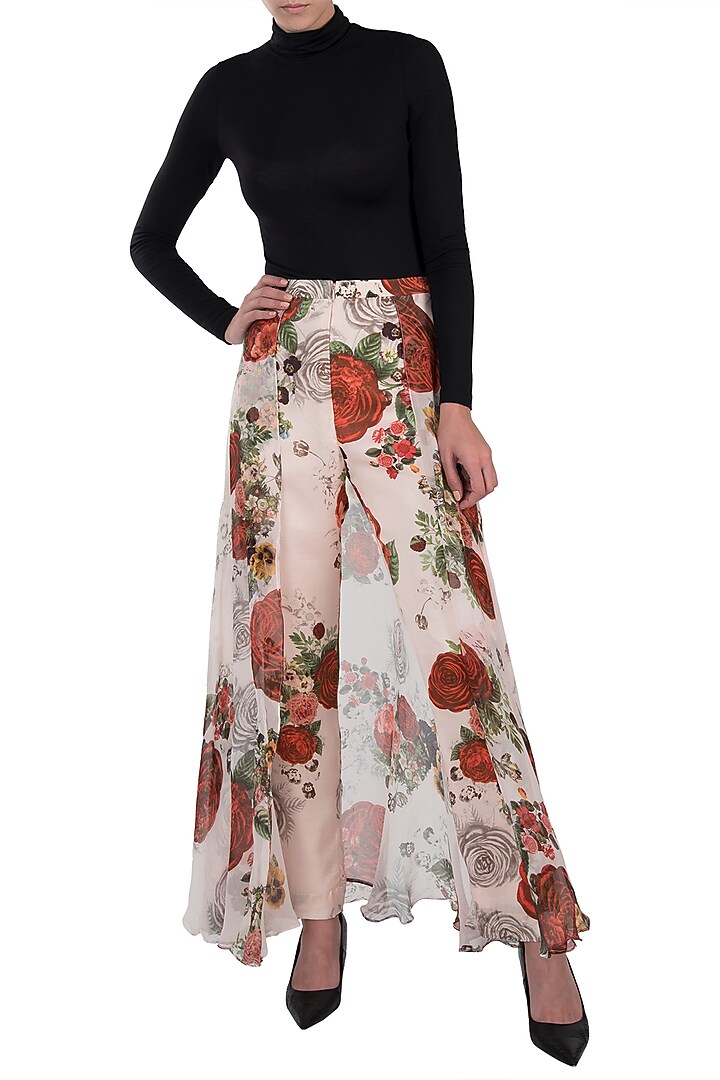 White printed rose flared pants by Kashmiraa at Pernia's Pop Up Shop