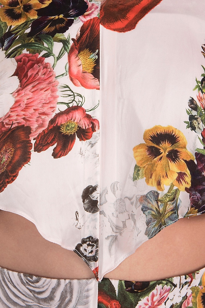 White printed rose dramatic sleeves jumpsuit by Kashmiraa at Pernia's Pop Up Shop
