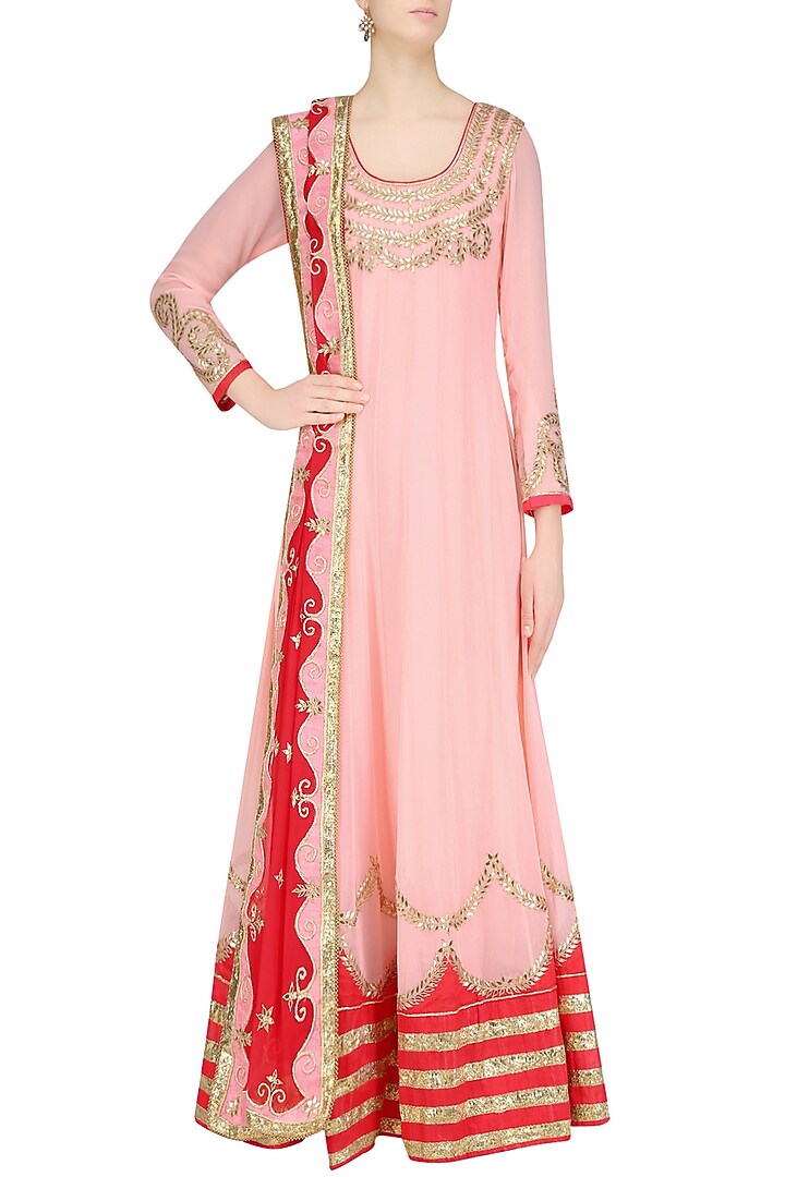 Peach and red floor length kalidar flared anarkali set available only at Pernia's Pop Up Shop.