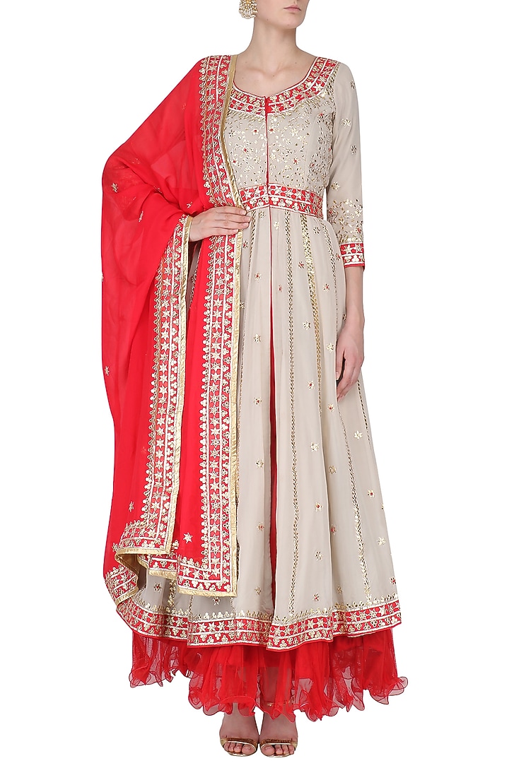 Beige gota patti work anarkali and red dupatta setavailable only at Pernia's Pop Up Shop.