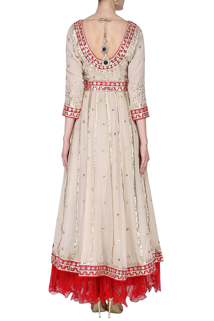 Beige gota patti work anarkali and red dupatta setavailable only at Pernia's Pop Up Shop.