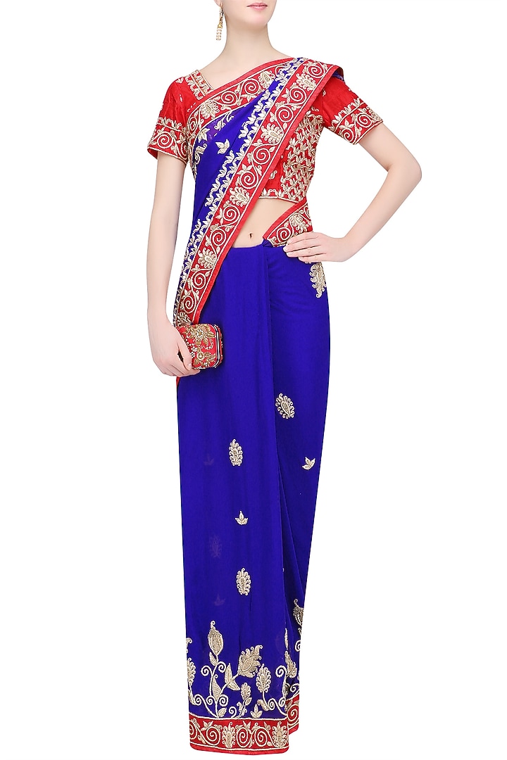 Royal blue embroidered saree and red blouse set available only at Pernia's Pop Up Shop.