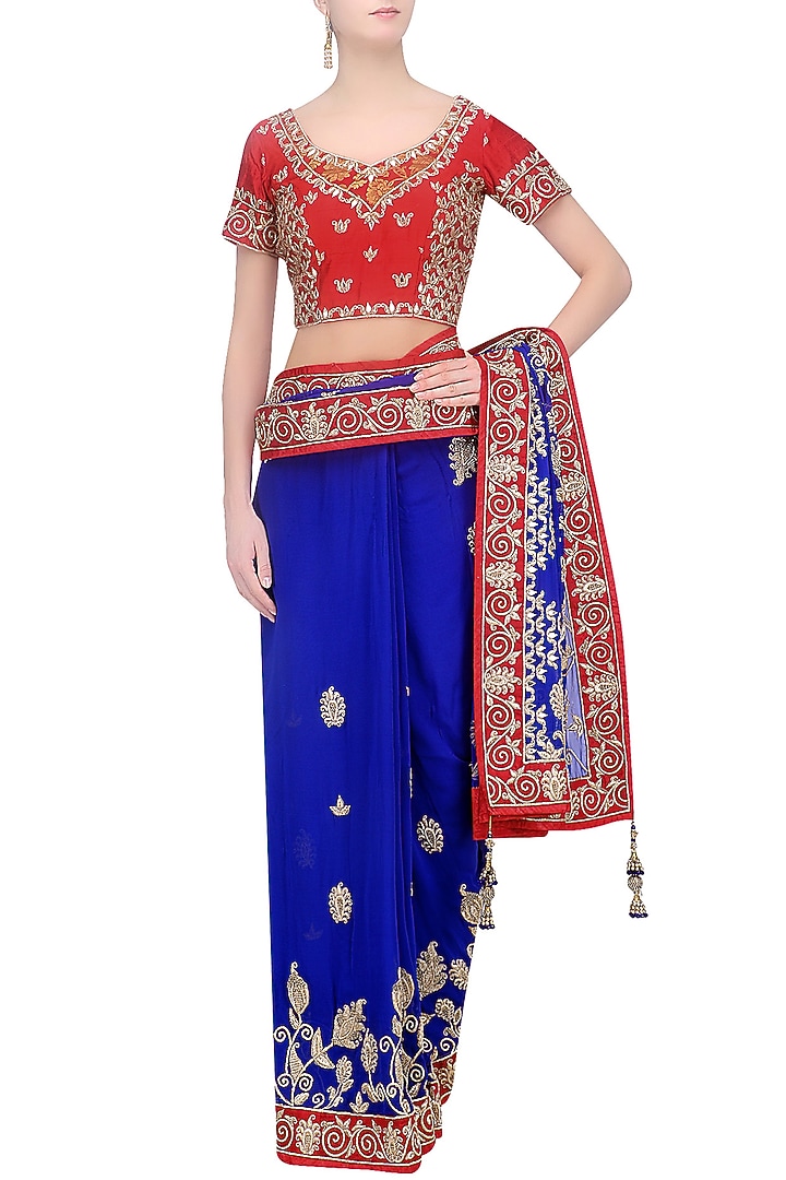 Royal blue embroidered saree and red blouse set available only at Pernia's Pop Up Shop.