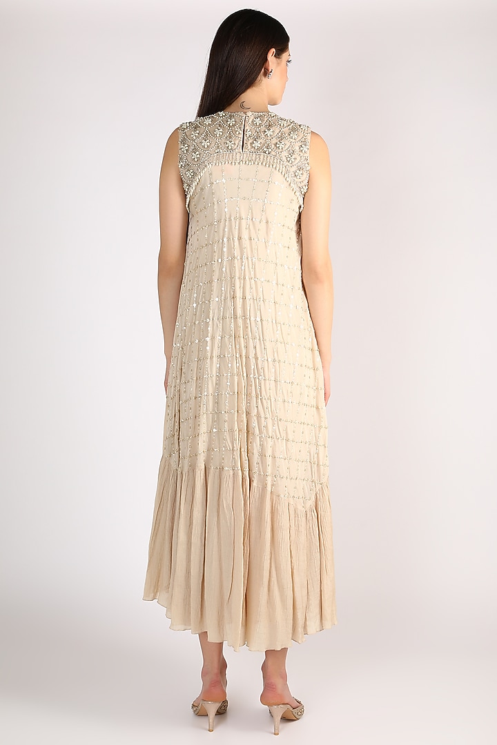 Beige Embroidered Tiered Vacation Dress by Keith Gomes at Pernia's Pop Up Shop